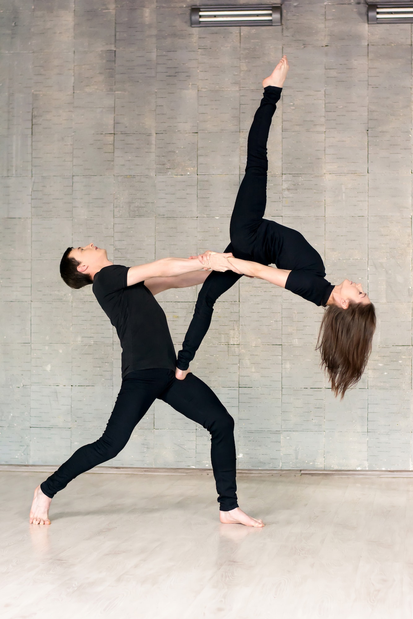 Young couple of dancers in modern dance.
